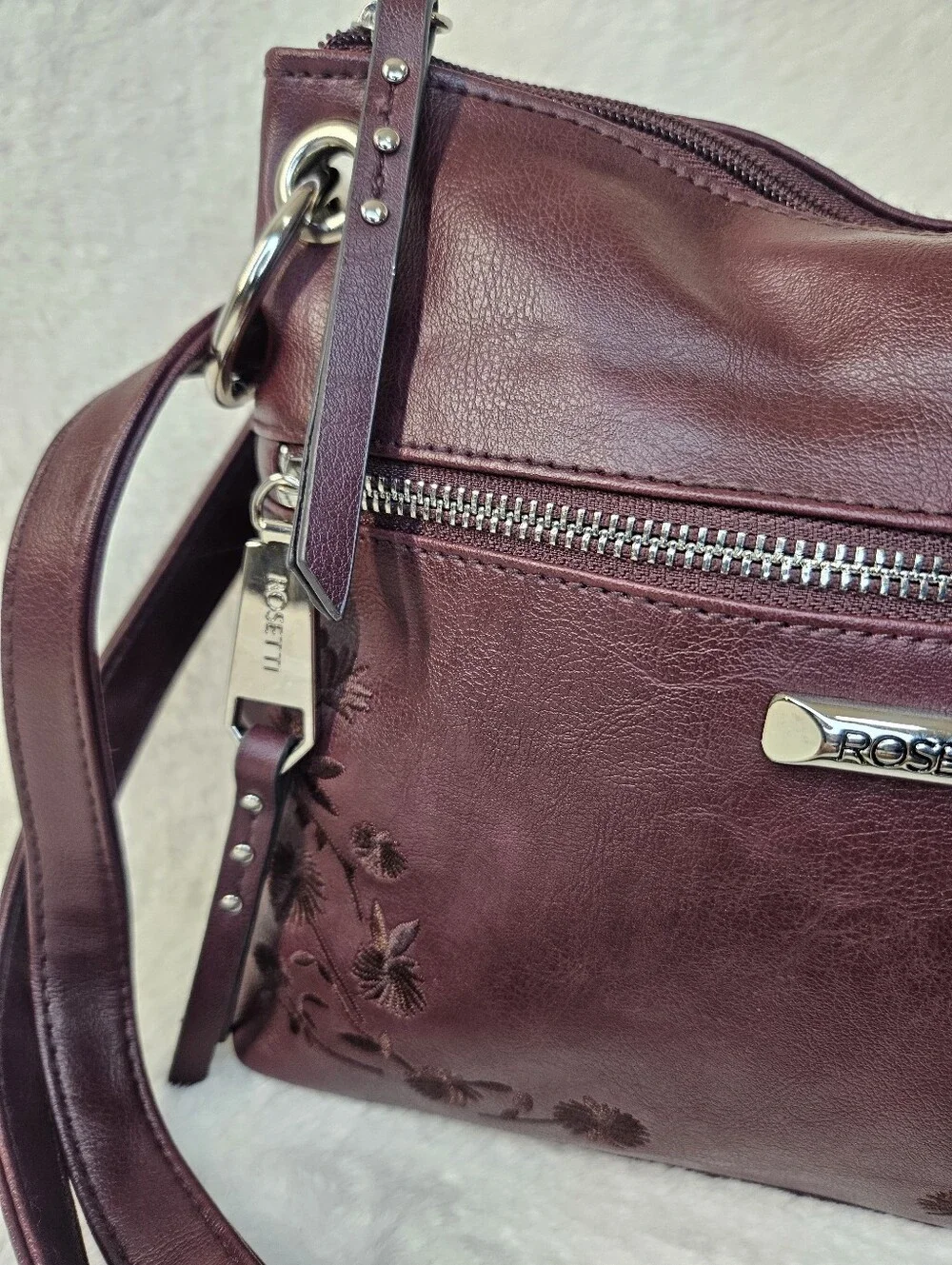 Rosetti Burgundy Crossbody Bag with Floral Embossing